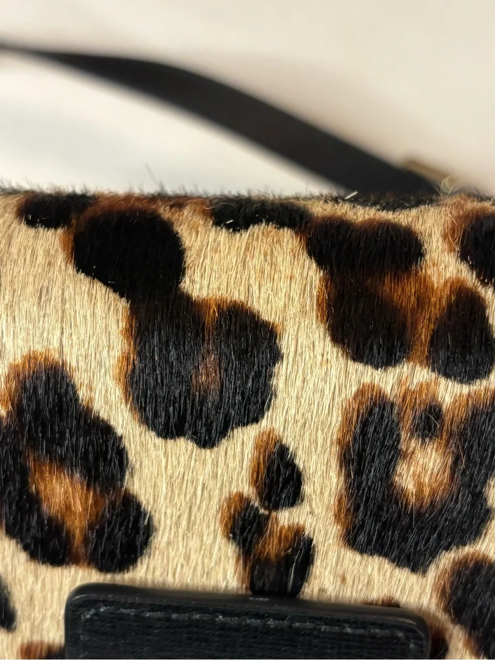 Furla Bella mini crossbody with leopard print calf hair and leather. Adjustable
